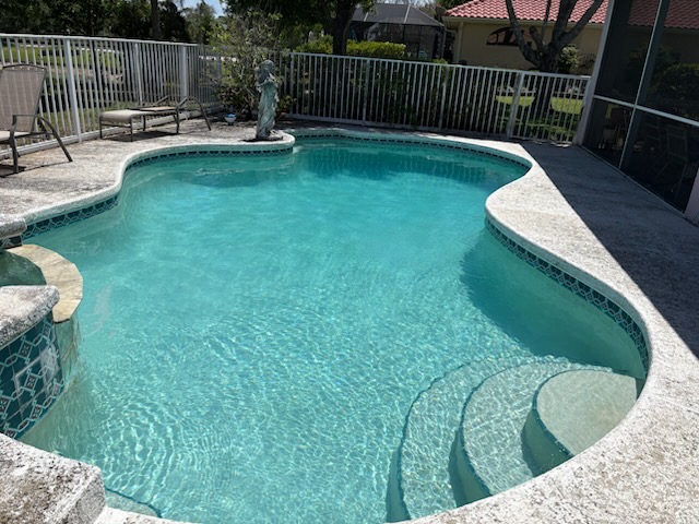 Same pool close-up showing clear, balanced turquoise water after cleaning