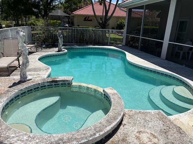 Same gated pool and spa restored to clear turquoise water after Excel Pool Care service